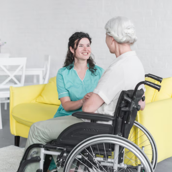 A Dignity Support Services caregiver providing one-on-one NDIS support in a client's home. 