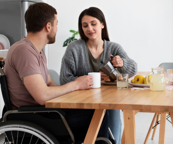 The clean and organised shared kitchen of an NDIS SIL provider house in Melbourne